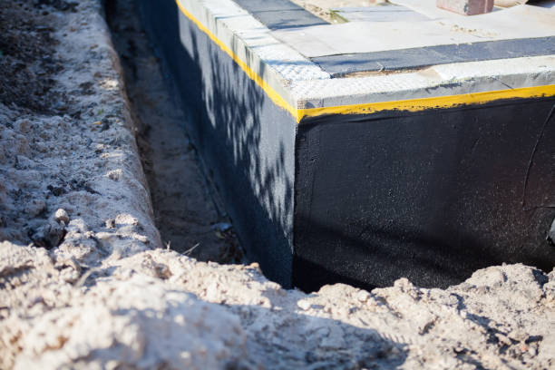 Professional Foundation Crack Repair technician working in Perkasie, PA